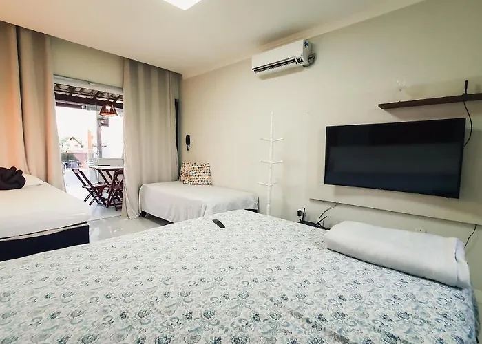 Confortável casa em Arembepe,100 metros da Praia com Churrasqueira Piscina e Wi-fi